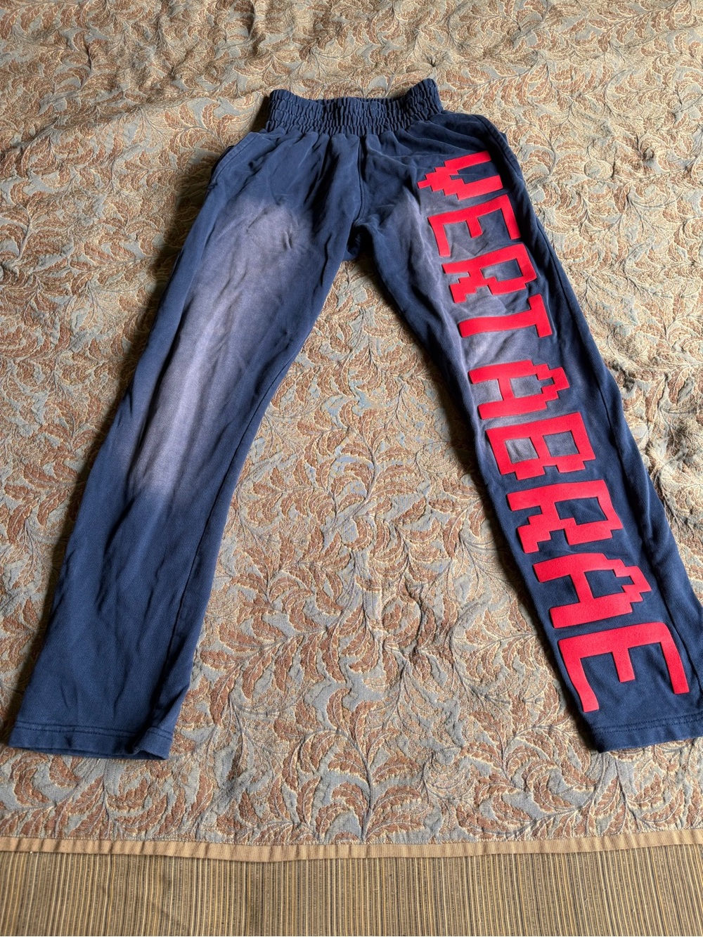 blue and red vertabrae sweatpants